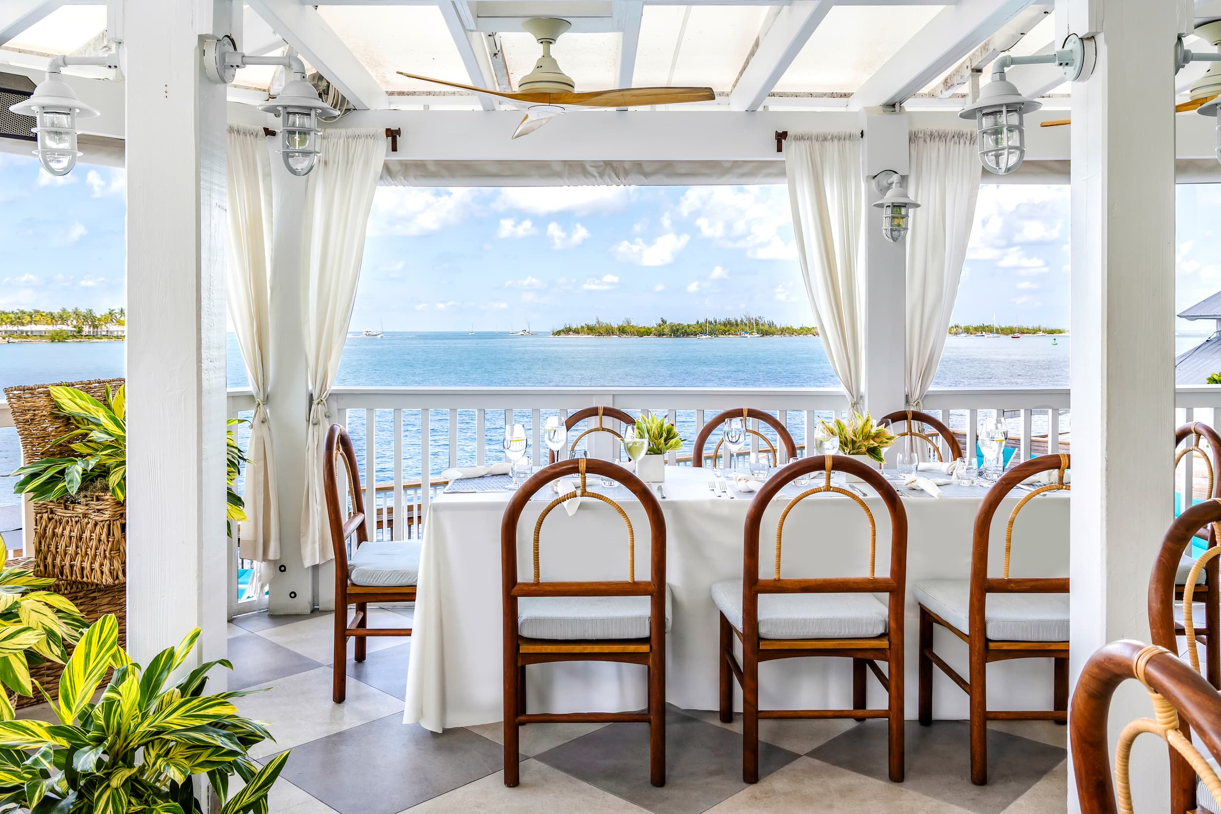 Table set overlooking the sea at Ocean Key Resort & Spa in Key West, Florida