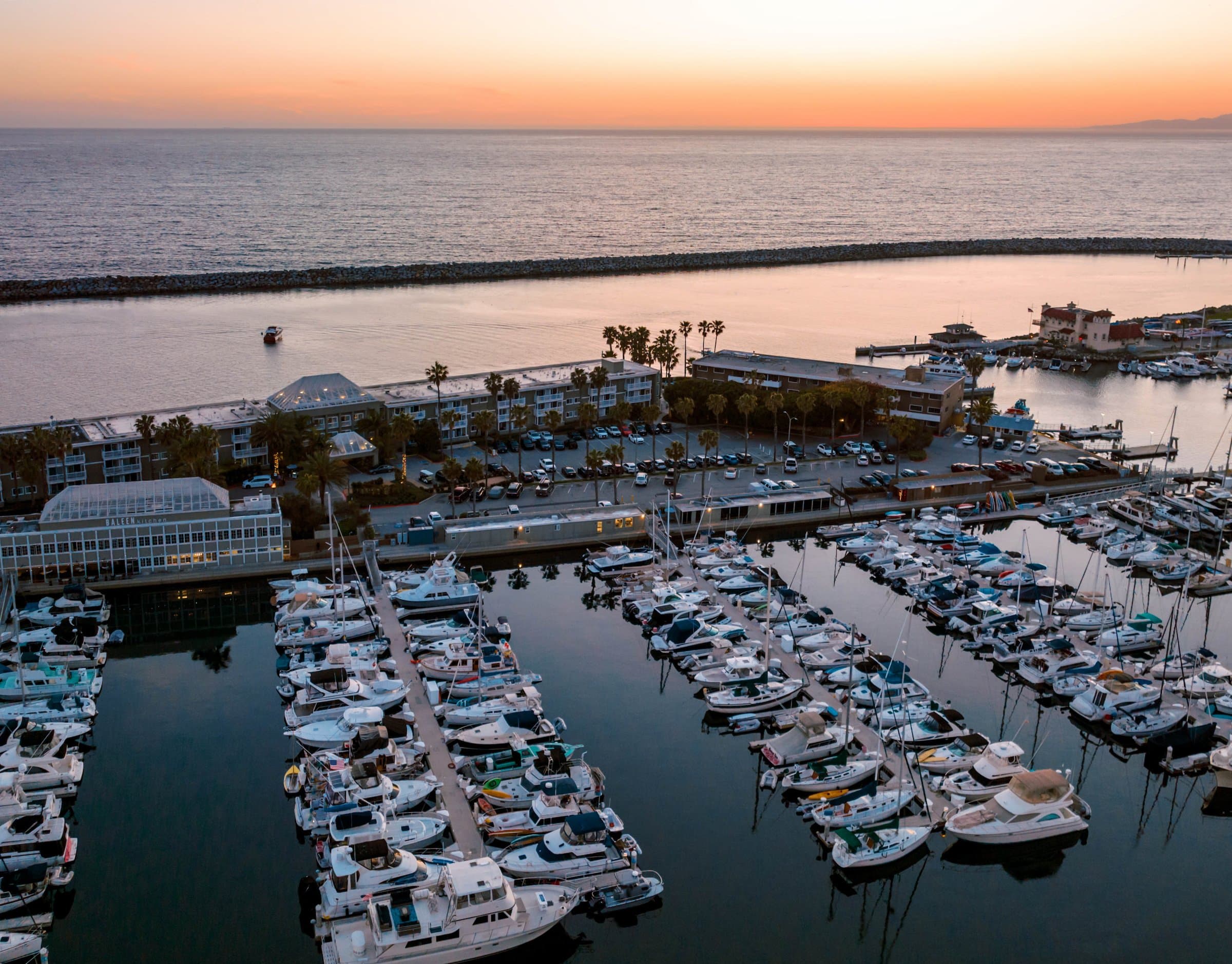 aerial view of a harbor and The Portofino Hotel & Marina at Redondo Beach, California