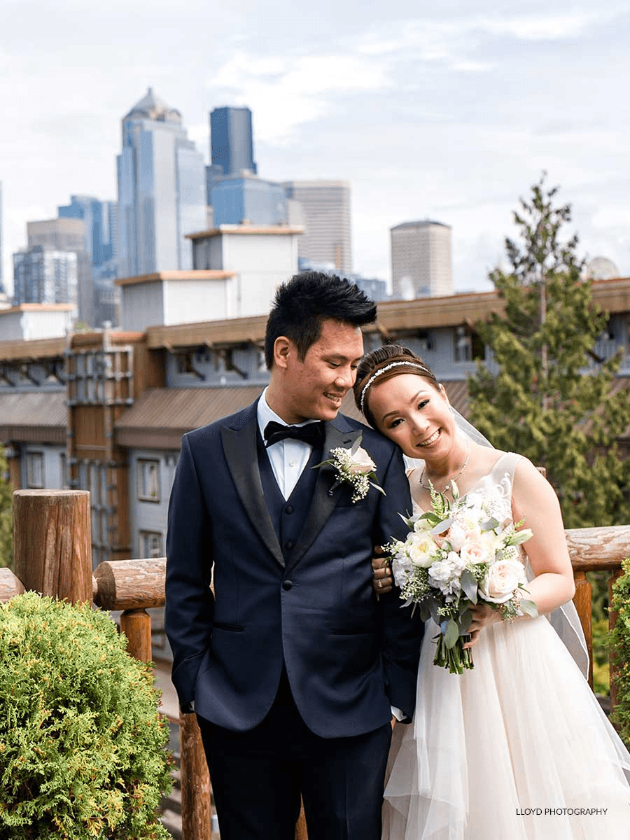 Bride and groom taking pictures at a Noble House Hotels & Resorts property