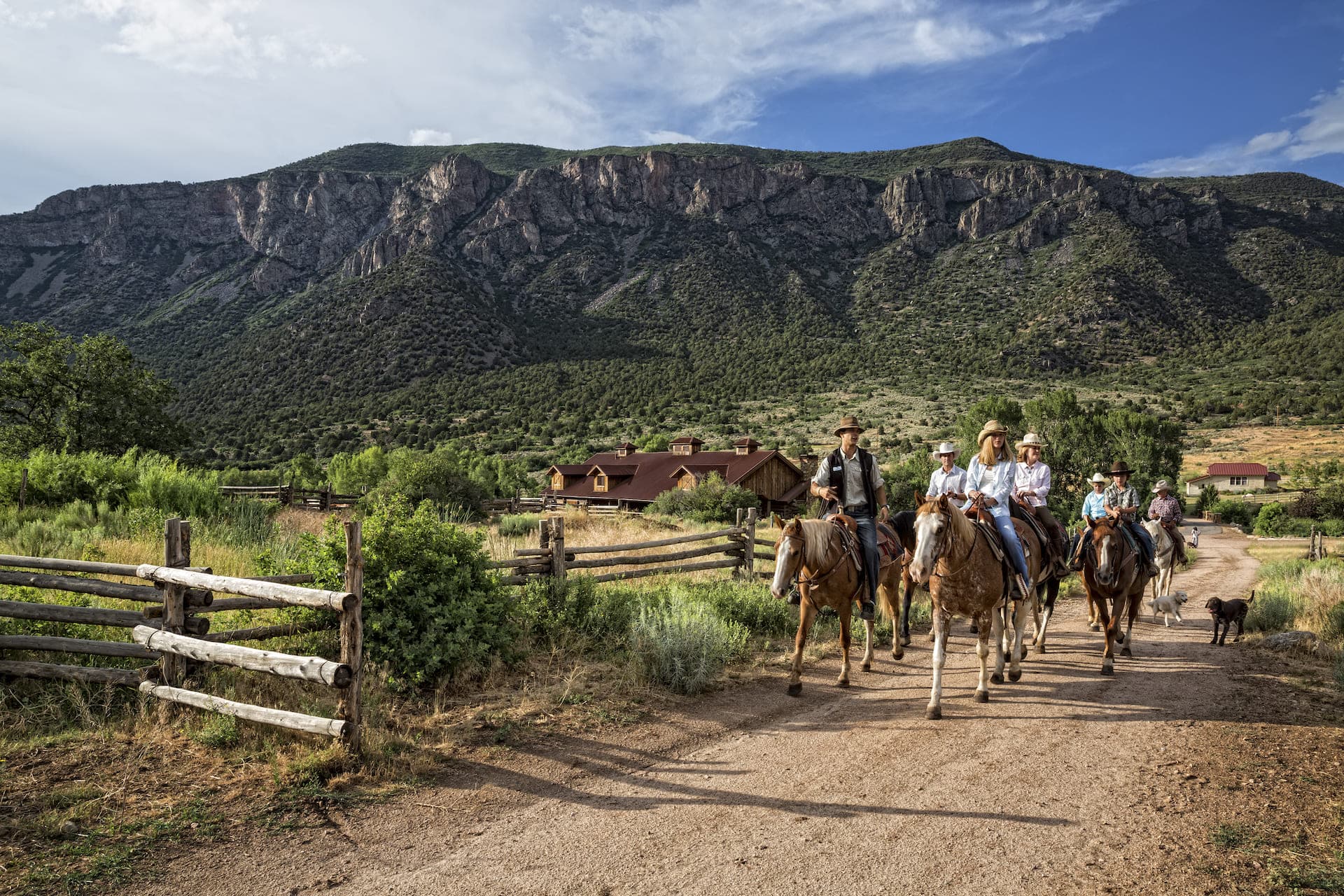 Group of people riding horses at Gateway Canyons Resort & Spa