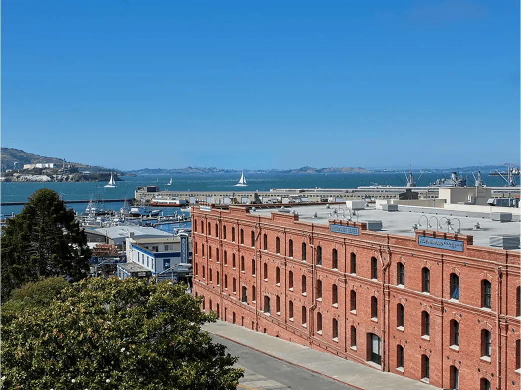 Street view of The Argonaut Hotel and the Blue Mermaid restaurant in San Francisco