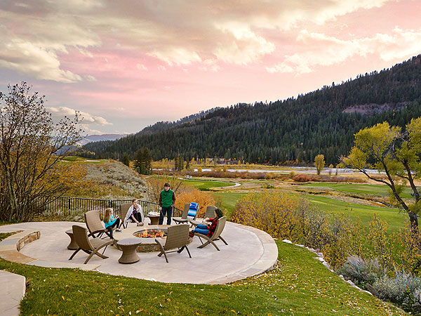 family around firepit at Snake River Sporting Club